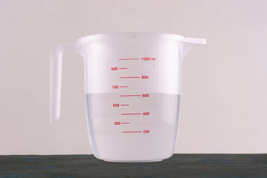 Kitchenware. Measuring Cup With Water.