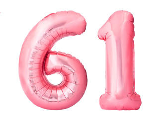 Number 61 sixty one made of rose gold inflatable balloons isolated on white background. Pink helium...