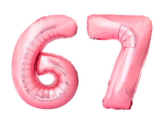 Number 67 sixty seven made of rose gold inflatable balloons isolated on white background. Pink...