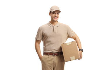 Smiling delivery man holding a package