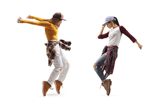 Two young females dancing street dance style