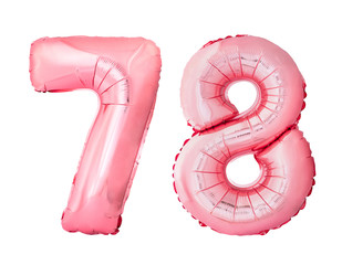 Number 78 seventy eight of rose gold inflatable balloons isolated on white background. Pink helium...