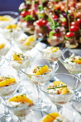 Catering service. snack at food court table during event