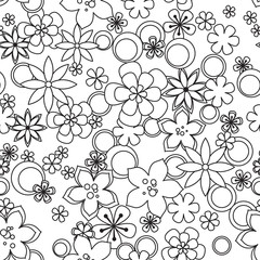 Seamless pattern made of black and white flowers.
