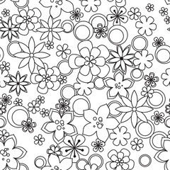 Seamless pattern made of black and white flowers.