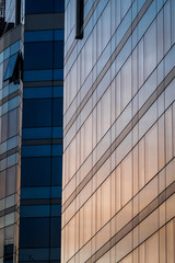 Sunrise reflection on a modern building - Paris, France