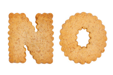 Word NO made of sweet cookie alphabet letters isolated on white background. Diet concept