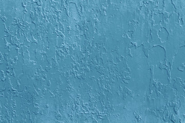 Texture of old blue paint on wall.