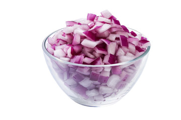 chopped red onions in a transparent glass bowl isolated on white background
