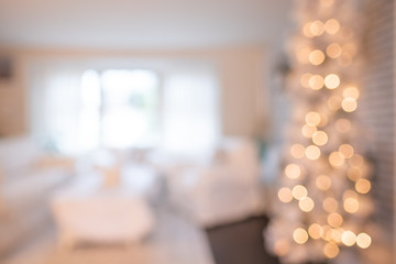 soft abstract image of a Christmas holiday tree in an American home
