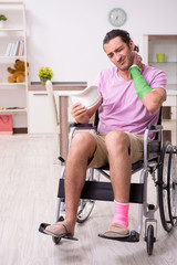 Fototapeta premium Young man suffering at home after car accident