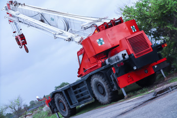 The red truck crane stops on holiday