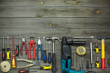 Tools in the workshop.  On the table are tools for various types of construction and repair work on...