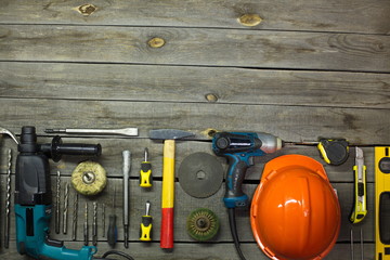Tools in the workshop.  On the table are tools for various types of construction and repair work on wood, metal, concrete, plastic and other materials.