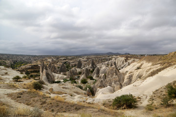 Unusually shaped volcanic rocks near the village of Goreme in the Cappadocia region of Turkey.
