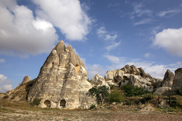 Fototapeta na wymiar Unusually shaped volcanic rocks near the village of Goreme in the Cappadocia region of Turkey.