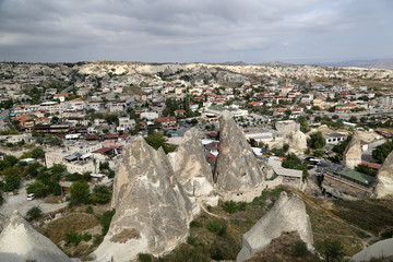 Naklejka premium Goreme, Turkey - 09/15/2019: Volcanic rocks of an unusual shape in the vicinity of the village of Goreme in the Cappadocia region in Turkey.