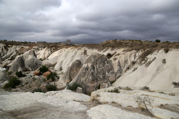 Goreme, Turkey - 09/15/2019: Volcanic rocks of an unusual shape in the vicinity of the village of Goreme in the Cappadocia region in Turkey.