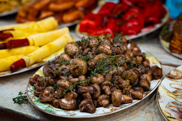 Fried mushrooms on a plate. Street Food Festival.
