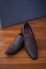 A pair of brown leather shoes for the wedding day or working in the office.
