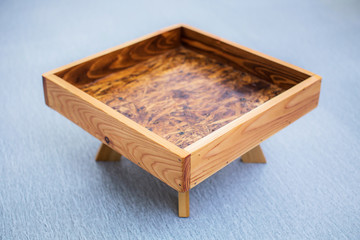 Small wooden tray made of used pallet wood.