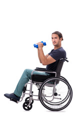 Fototapeta na wymiar Young disabled man doing physical exercises isolated on white