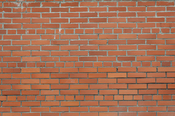Fototapeta premium background of a red and orange brick wall. 