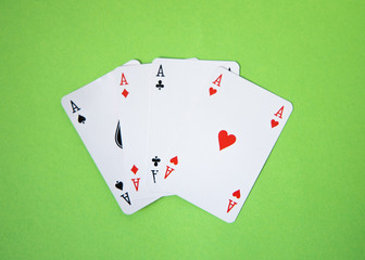 Winner poker cards over a green background