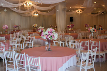Dining table decorated for weddings held in Malaysia. The decoration is decorated by caterer.