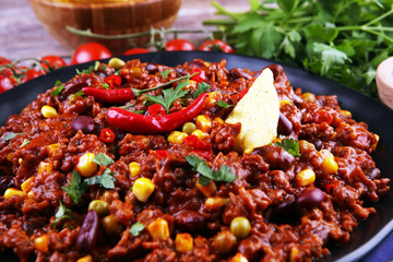 Hot chili con carne. mexican food tasty and spicy wit beans