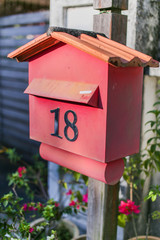 Red letter box number 18.