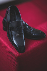 A pair of black leather shoes for the wedding day or working in the office.