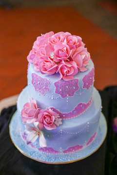a cake decorated for the bride and groom at a wedding