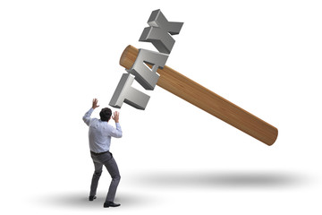 Businessman under the burden of tax payments
