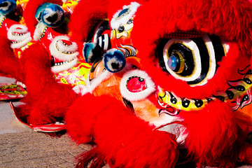 Asian New Year, traditional holiday. street performances and dancing of a dragon and a lion. The...