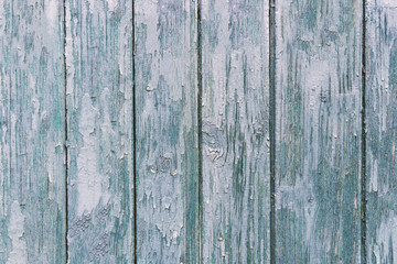 Vintage wood background with peeling paint.