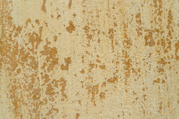 yellow plaster background on the wall