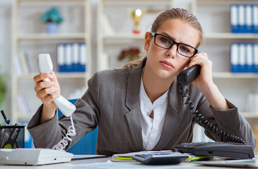 Young businesswoman accountant working in the office