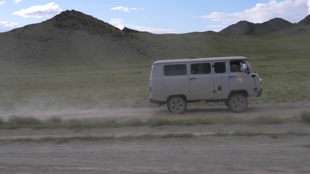 Driving soviet style Vans across the Mongolian grasslands.