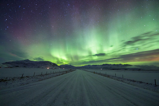 Northern Lights (Aurora Borealis) above a road