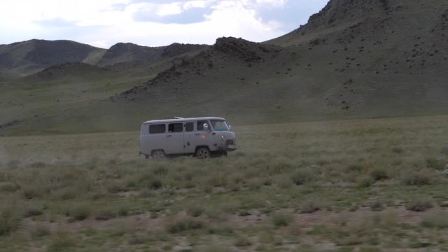 Driving incredibly cool old soviet style Russian Vans across the Mongolian Steppe.