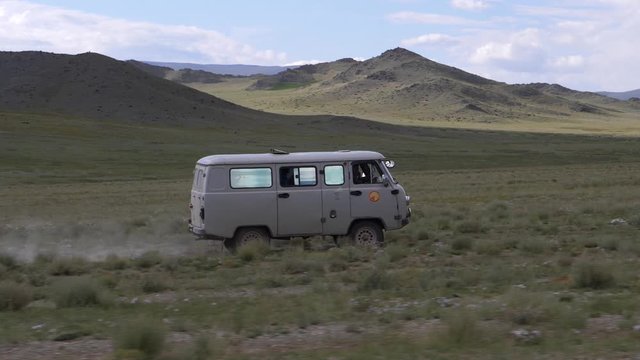 Driving old Russian Soviet Style Vans across the Mongolian Steppe.