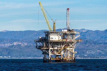 Platform Gina in the Santa Barbara Channel contrasts with metallic structure against the rolling...
