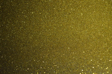 The bokeh of the glittering sheet surface has reflected light.