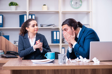 Two employees suffering at workplace