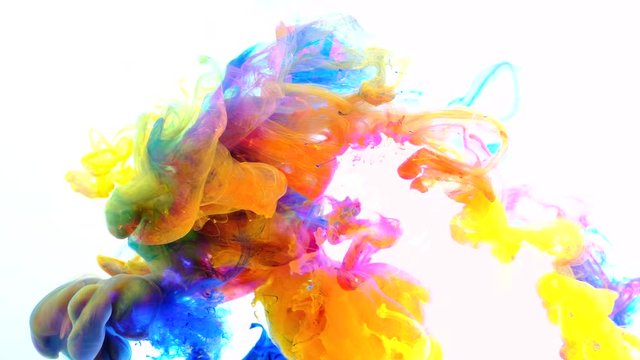 4K ,Color paint drops in water , abstract color mix , drop of Ink color mix paint falling on water Colorful ink in water, 4K footage,