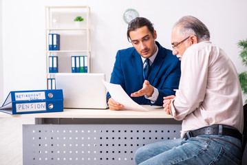 Financial advisor giving retirement advice to old man