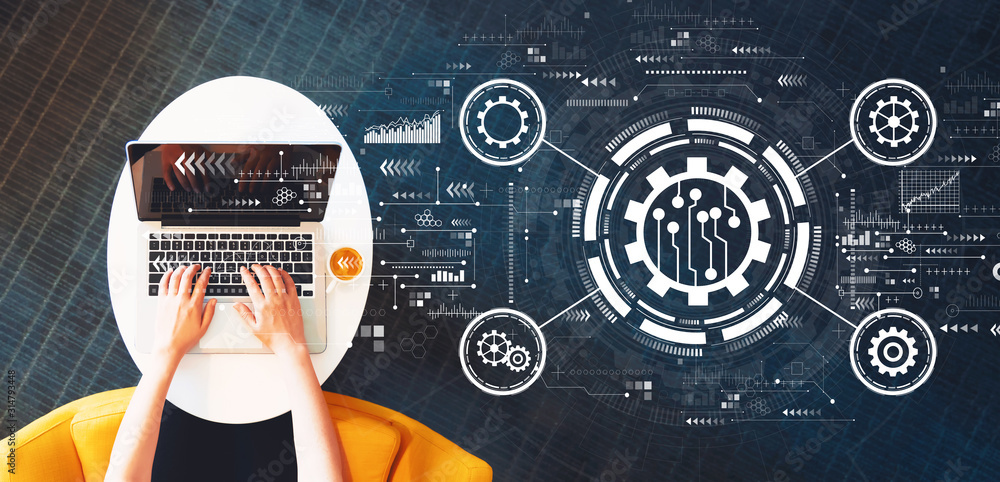 Aufkleber automation concept with person using a laptop on a white table