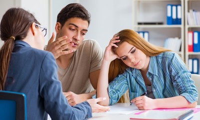 Obraz premium The young family dissappointed at high interest mortgage rate in