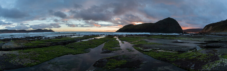 Fototapeta na wymiar Sunset on the Coast at Lion Rock, Tasmania
